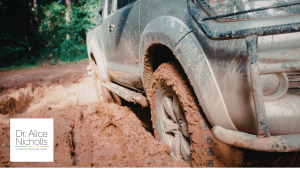 picture of 4x4 vehicle stuck in mud and unable to move.